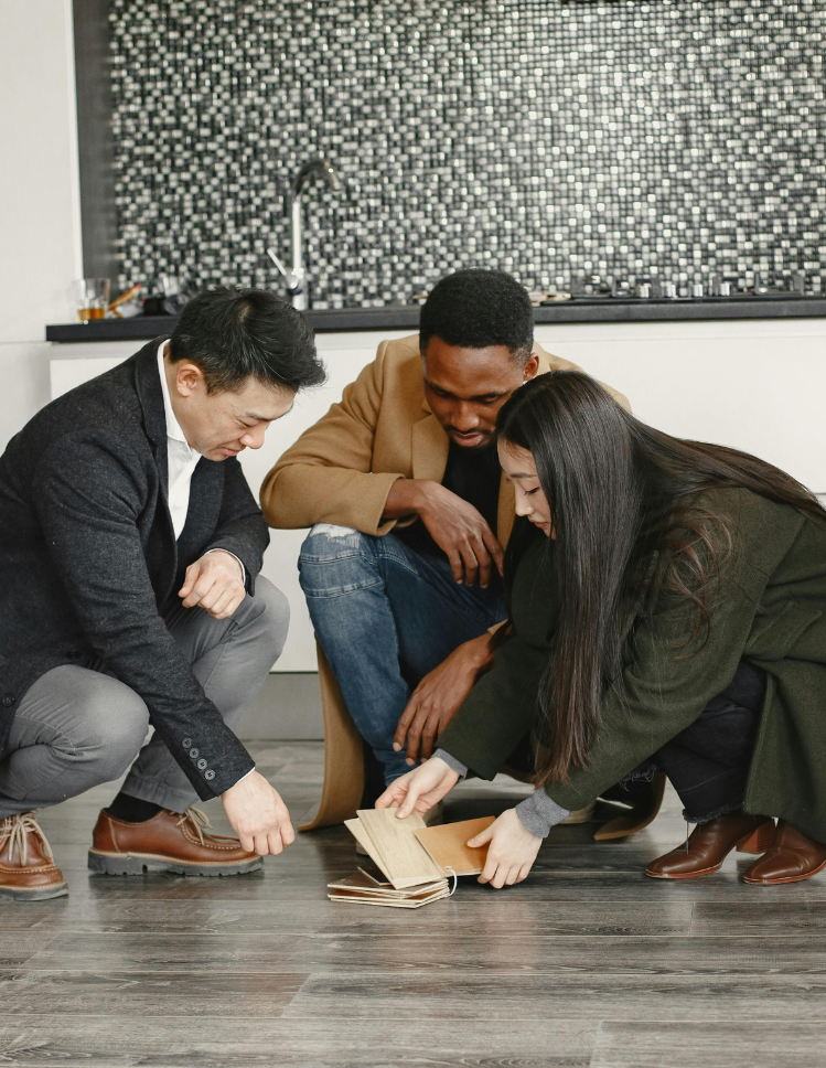 customers looking at flooring samples