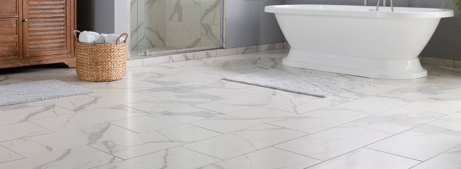 white marble look tile floor in bathroom