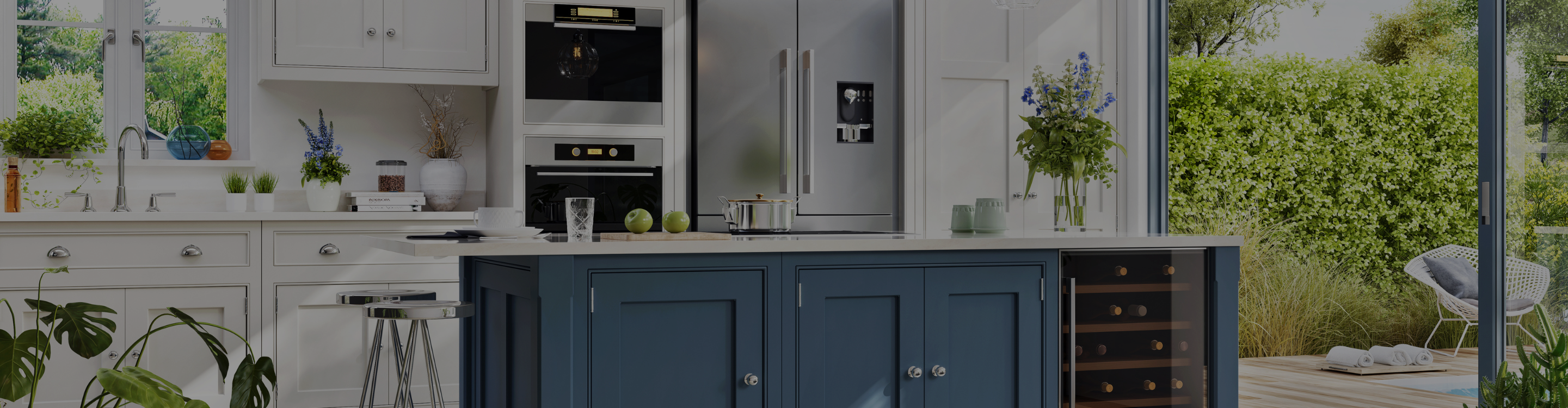 White cabinets with pewter fixtures. 