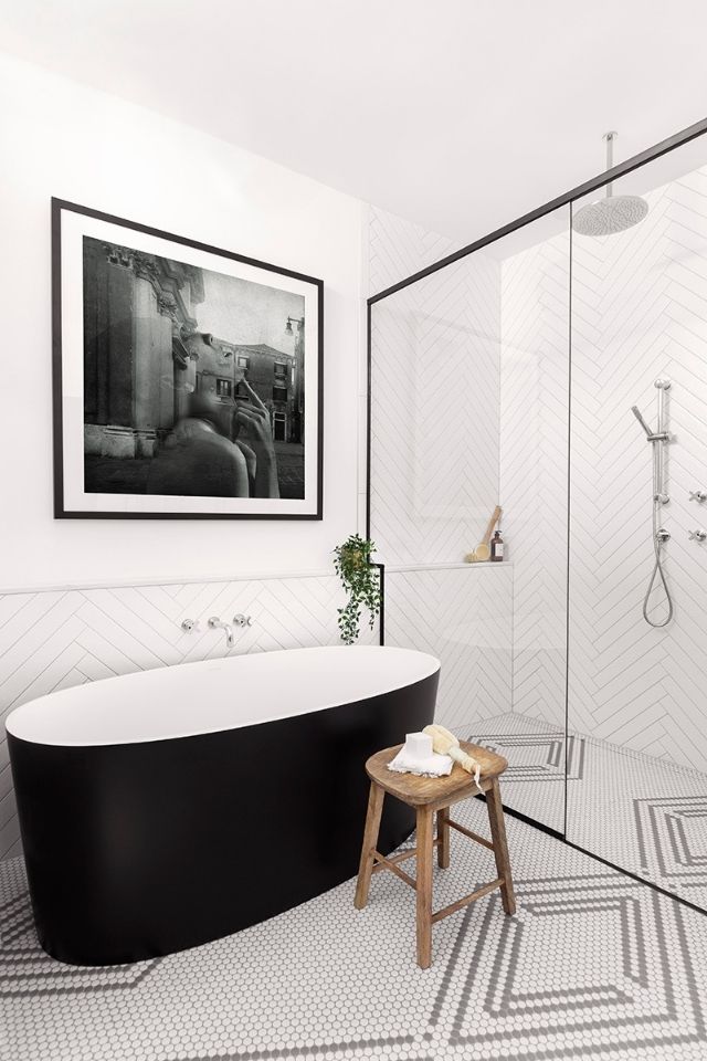 black soaker tub and glass shower with mosaic tile | Hibou Design and Co.