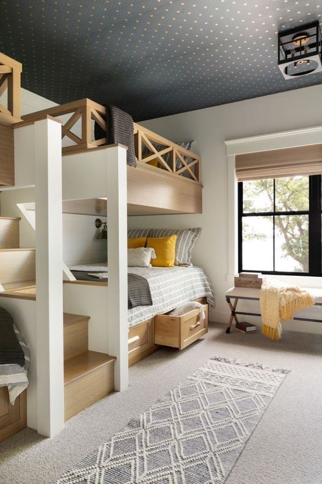 Kids room with built-in bunk beds and fun flooring 