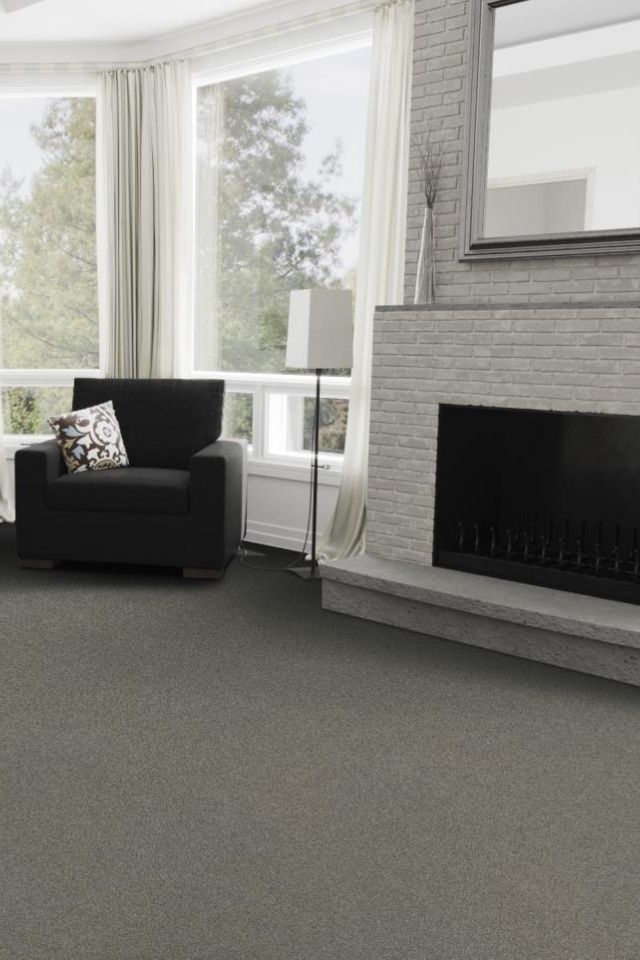 Resista Soft Style carpet in living room in front of fireplace