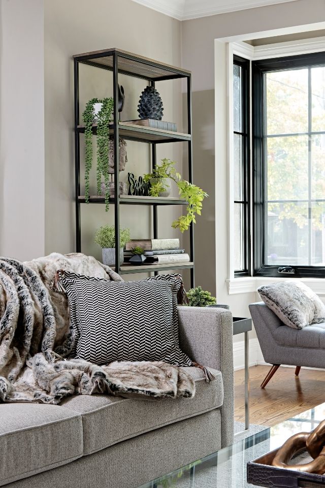 cozy gray sofa with fur throw Design by ANDREA COLMAN  Photography by MIKE CHAJECKI