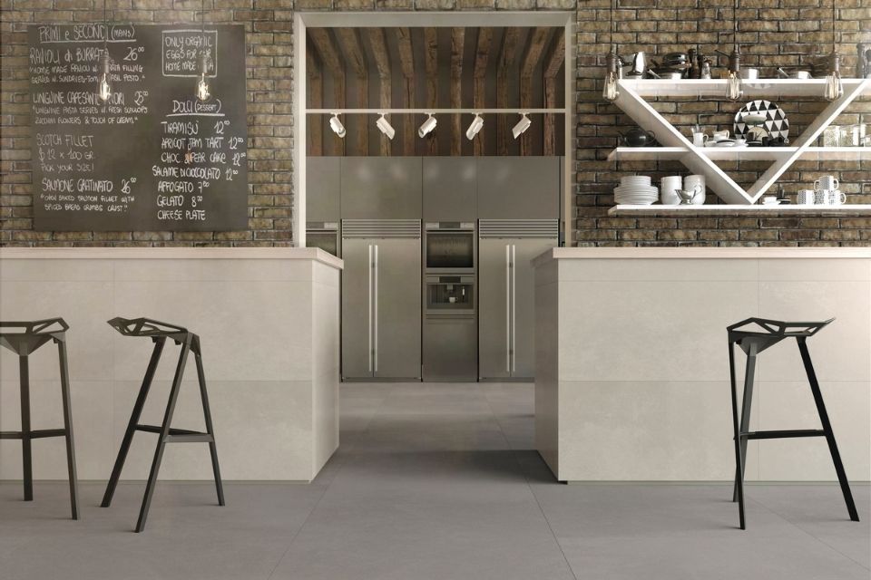 Gray commercial tile in restaurant on walls and floors 
