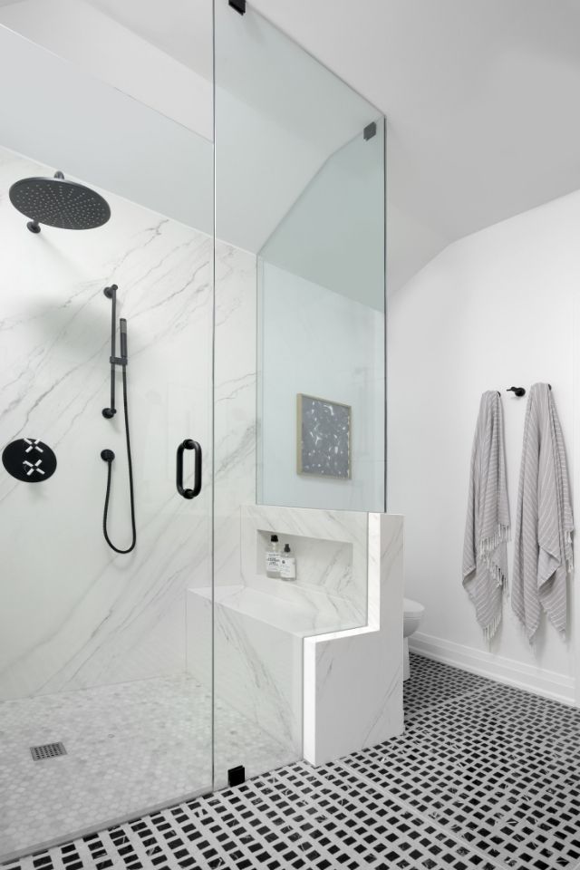 Black and white airy walk in shower in stylish bathroom design 