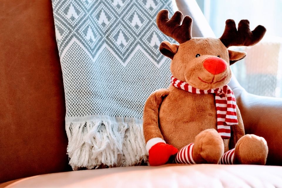 Christmas throw blanket and reindeer plush