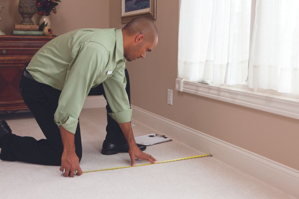 Measuring carpet courtesy of Carpet One