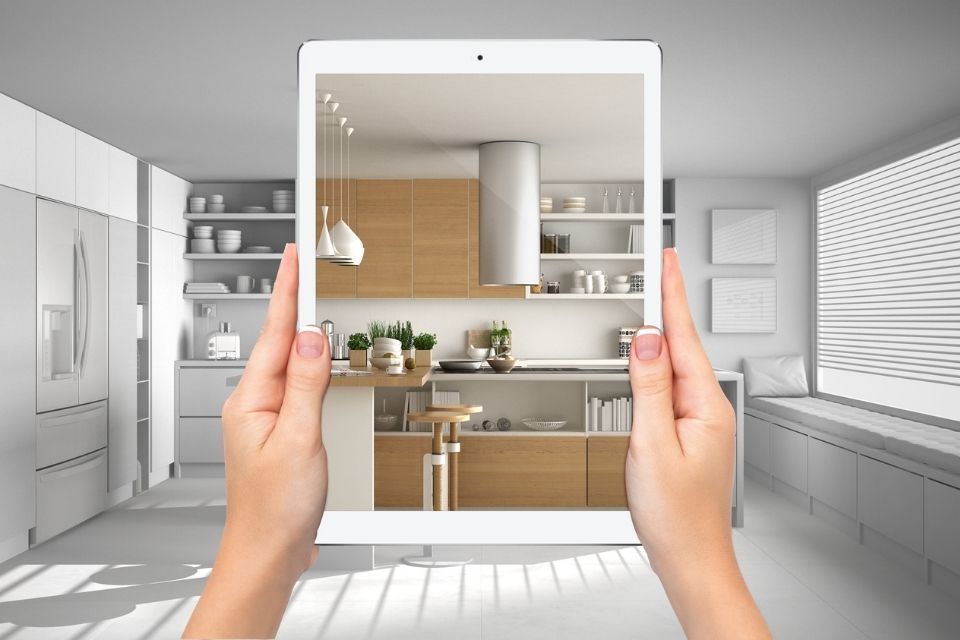 Looking at the big picture while designing a kitchen through an ipad